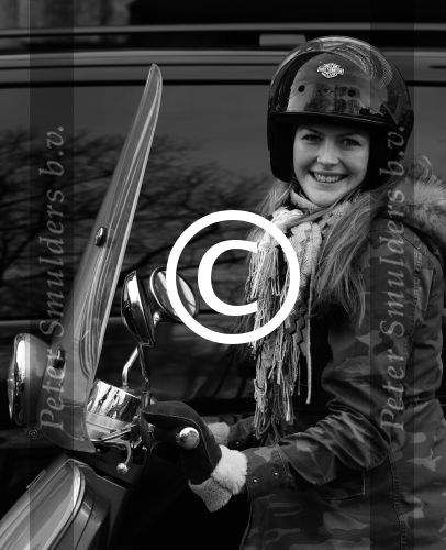 Amsterdam 28 januari 2013
Renee Gunning op vespa scooter.
Peter Smulders bv