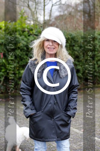 Aalsmeer 17 januari 2014
Bonnie st Claire met haar hondjes bij haar huis.
