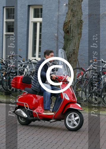 Amsterdam 22 januari 2014
Martijn Krabbe op zijn vespa scooter.