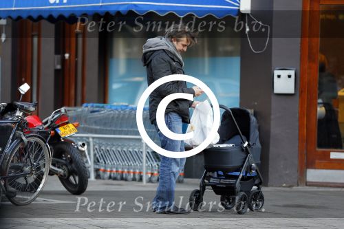 Amsterdam  11 januari 2014
Victor Reinier met vriendin en baby in kinderwagen.