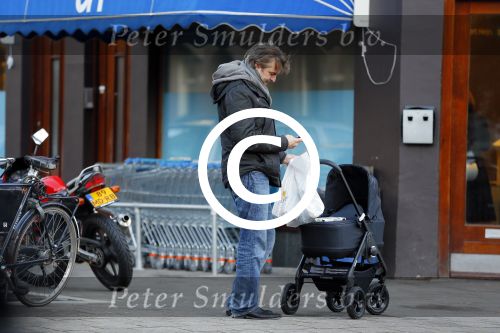Amsterdam  11 januari 2014
Victor Reinier met vriendin en baby in kinderwagen.