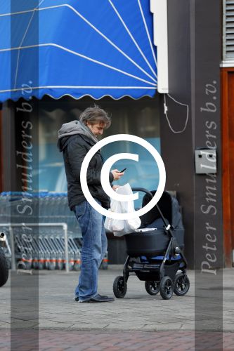 Amsterdam  11 januari 2014
Victor Reinier met vriendin en baby in kinderwagen.