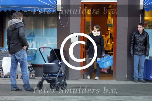Amsterdam  11 januari 2014
Victor Reinier met vriendin en baby in kinderwagen.