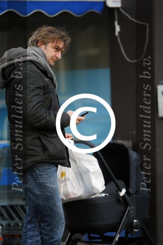 Amsterdam  11 januari 2014
Victor Reinier met vriendin en baby in kinderwagen.
