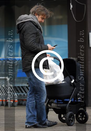 Amsterdam  11 januari 2014
Victor Reinier met vriendin en baby in kinderwagen.