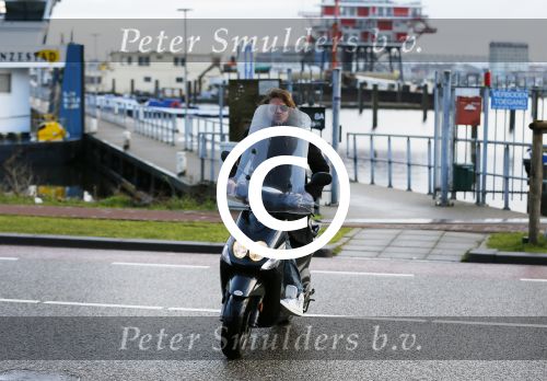 Amsterdam 1 februari 2015
Tygo Gernandt op zijn scooter.