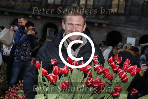 Amsterdam 21 januari 2017 
Boer Tom Groot bij event met tulpen bij paleis op de dam.