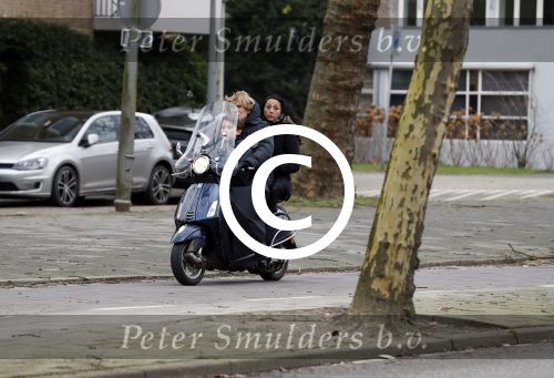 Amsterdam 27 januari 2018 
Hans Jorritsma met zijn vrouw en zoon op vespa scooter