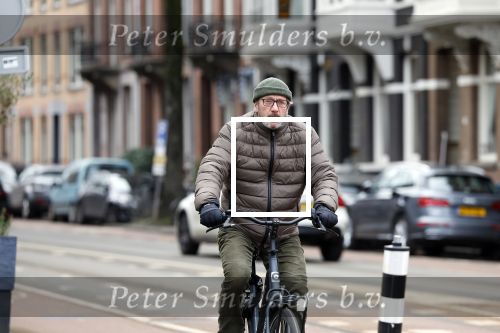 Amsterdam 17 januari 2022
Gijs Scholten v Aschat op de fiets in Amsterdam zuid