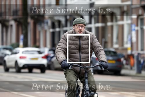 Amsterdam 17 januari 2022
Gijs Scholten v Aschat op de fiets in Amsterdam zuid