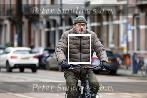 Amsterdam 17 januari 2022
Gijs Scholten v Aschat op de fiets in Amsterdam zuid