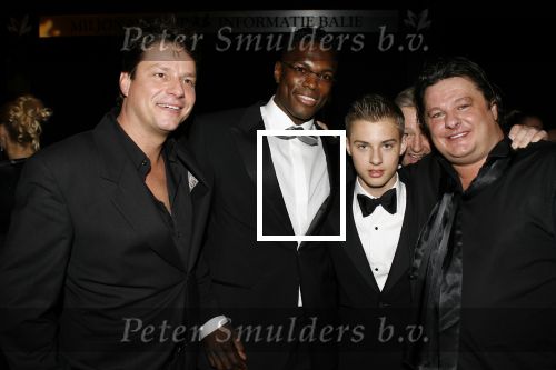 Amsterdam 7 december 2006
Miljonairfair in de rai in amsterdam.Ruud Hiensch met zoon en Remy Bolansky
Peter Smulders bv
