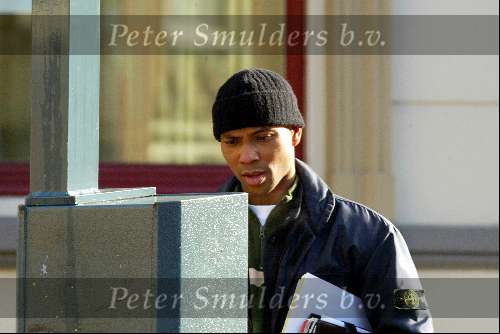 Amsterdam 5 februari 2003
Humberto Tan in vrijetijdskleding  en met een muts op
Parkeerautomaat
Peter Smulders bv