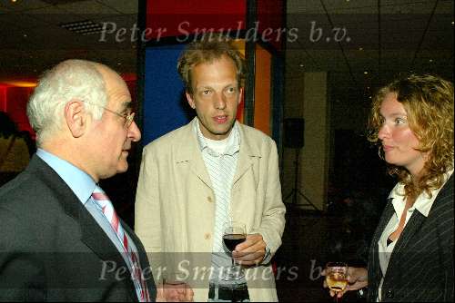 Bussum 10 februari 2004
Uitreiking gouden harpen in het spant.
Frits Spits met Sjors Frohlich... en vriendin