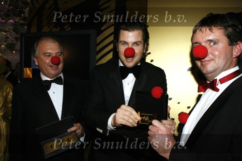 Amsterdam 7 december 2006
Miljonairfair in de rai in amsterdam.Winston Gerschtanowitz creditcard met rode clownsneus