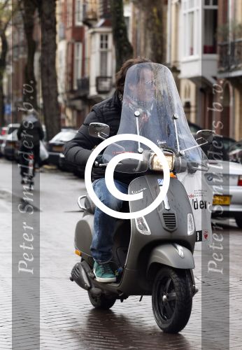 Amsterdam 17 december 2011
Leco v Zadelhoff op zijn vespa scooter.
Peter Smulders bv