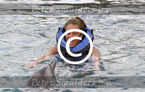 Curacao 8 januari 2011
Gerard Joling Patty Brard en Romy Omtzigt zwemmen bij de dolphin academy
bij seaquarium met dolfijnen.
Peter Smulders bv