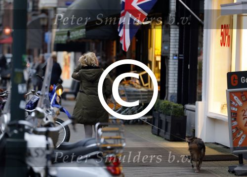 Amsterdam 8 januari 2012
Bridget Maasland met hond en op scooter.
Peter Smulders bv