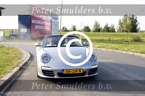 Heteren 29 juni 2009
Opening winkel bij porsche centrum Geldrland met div bn ers waaronder
Koert-Jan de Bruijn Anouk Smulders Tom Sebastian  en Jeroen v Koningsbrugge.
Eigenaar van Porsche centrum is Mark Wegh.
Peter Smulders bv
