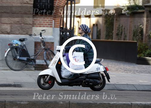 Amsterdam 10 januari 2012
Paul Turner op scooter.
Peter Smulders bv