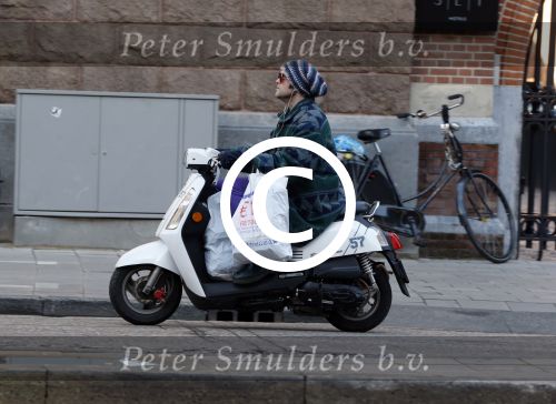 Amsterdam 10 januari 2012
Paul Turner op scooter.
Peter Smulders bv