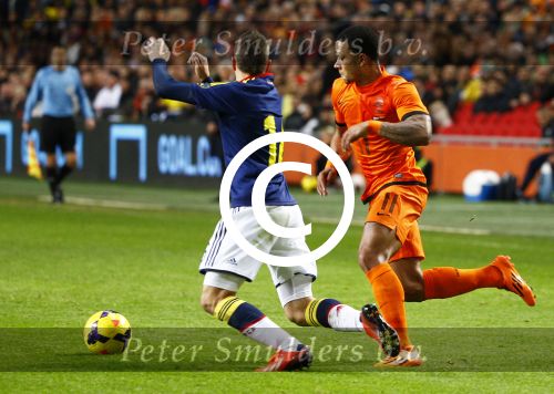 Amsterdam, 19 November 2013
Oefeninterland Nederland-Colombia, eindstand 0-0
Memphis Depay in duel met zijn ploeggenoot van PSV, Santiago Arias
Foto Peter Smulders BV