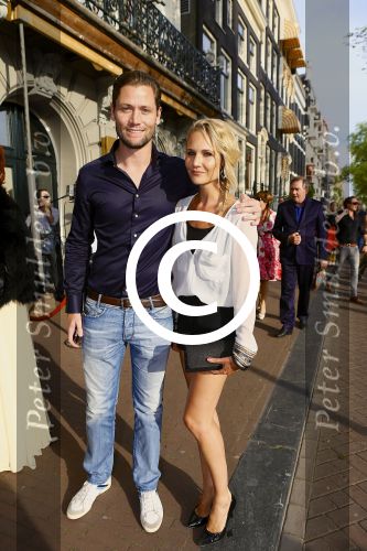 Amsterdam, 17 Juli 2013
Premiere Hans Klok The New Houdini in theater Carrï¿½. 
Met op de foto  Kimberly Klaver met partner Bas Schothorst.