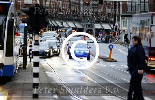 Amsterdam 14 januari 2015
Centaal station van Amsterdam gezien vanuit het eye theater.Koning Willem Alexander en koningin Maxima arriveren bij het paleis op de dam voor de nieuwjaarsreceptie. verlengde A8 Koning Willem Alexander