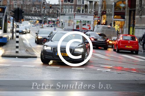 Amsterdam 14 januari 2015
Centaal station van Amsterdam gezien vanuit het eye theater.Koning Willem Alexander en koningin Maxima arriveren bij het paleis op de dam voor de nieuwjaarsreceptie. verlengde A8 Koning Willem Alexander
