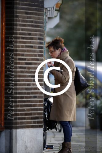 Amsterdam 4 december 2015
Carolien v d Bewrg op de fiets in Amsterdam