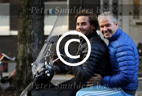 Amsterdam 4 december 2015 
Dries Roelvink met zijn zoon Donnie op de vespa scooter