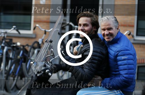 Amsterdam 4 december 2015 
Dries Roelvink met zijn zoon Donnie op de vespa scooter