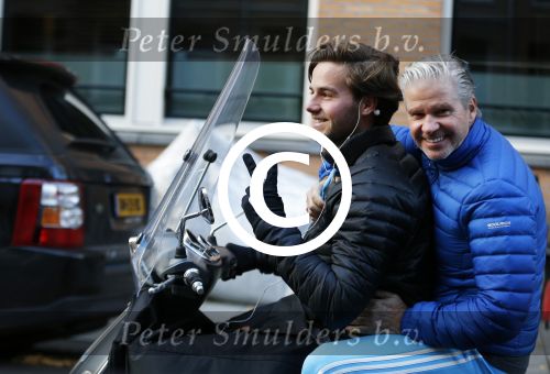 Amsterdam 4 december 2015 
Dries Roelvink met zijn zoon Donnie op de vespa scooter