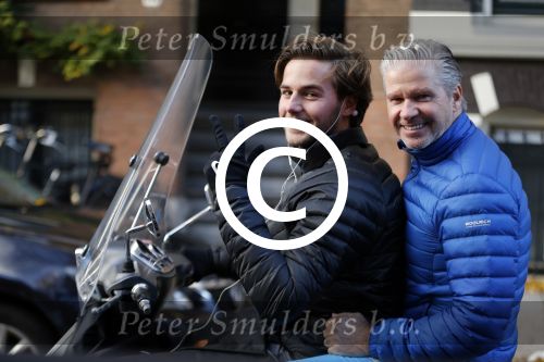 Amsterdam 4 december 2015 
Dries Roelvink met zijn zoon Donnie op de vespa scooter