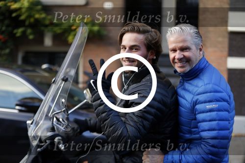 Amsterdam 4 december 2015 
Dries Roelvink met zijn zoon Donnie op de vespa scooter