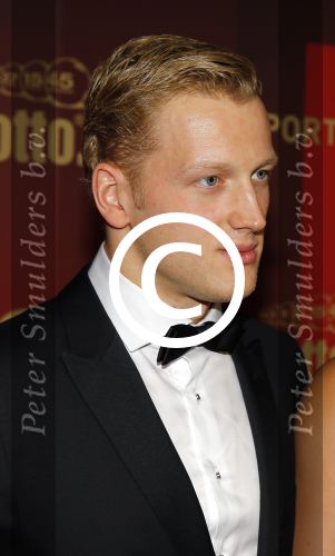 Amsterdam 15 december 2015
Sportgala/ sportverkiezing sportman en sportvrouw van het jaar in de Rai. 
Nederlands sportpresentatrice bij NOS Studio Sport. Ranomi Kromowidjojo met vriend Ferry Weertman