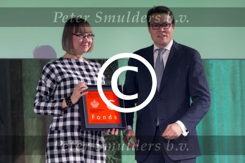 Koninklijke Familie bij uitreiking Prins Claus Prijs 2015 in het Koninklijk Paleis op de Dam. De Prins Claus Prijzen worden door het Prins Claus Fonds voor Cultuur en Ontwikkeling sinds 1997 jaarlijks toegekend aan kunstenaars, denkers en culturele organisaties. 

Royal Family at ceremony Prince Claus Award in 2015 at the Royal Palace on Dam Square. The Prince Claus Awards are presented by the Prince Claus Fund for Culture and Development since 1997 awarded annually to artists, thinkers and cultural organizations.

OP de foto / On the photo:  Oksana Shatalova (Kazachstan, 1972), visueel kunstenaar, criticus en conservator