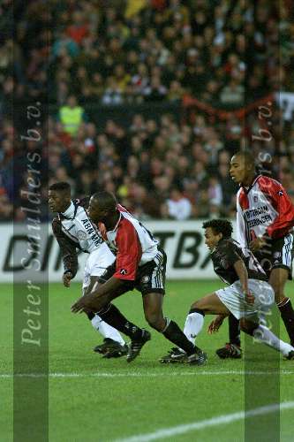 Rotterdam, 20 december 1998
Feyenoord-AJAX, eindstand 1-1
v.l.n.r.: Kofi Mensah, Ulrich v Gobbel, Wamberto en  Christian Gyan