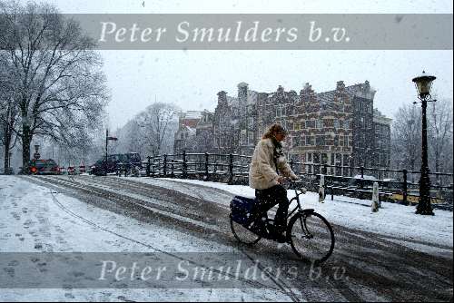 Amsterdam 30 januari 2003
Amsterdam bij Sneeuw Winter Grachten
Winters tafreel Fietser