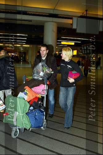 Schiphol 27 januari 2004
Aankomst op Schiphol van Marianne Timmer . Marianne Timmer samen met haar vriend Henk Timmer.
