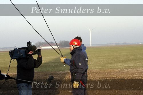 Biddinghuizen 16 januari 2006
Edwin Smulders en Klaas Wilting abseilen van windmolen van 70 meter hoog.