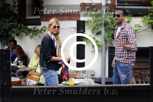 Amsterdam/Amstelveen 6 juli 2012
Badr Hari en Estelle Cruijff op terras en op weg naar reisburo in Lamborghini.
Peter Smulders bv
