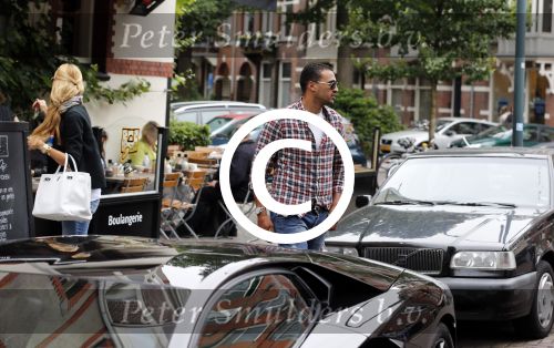 Amsterdam/Amstelveen 6 juli 2012
Badr Hari en Estelle Cruijff op terras en op weg naar reisburo in Lamborghini.
Peter Smulders bv