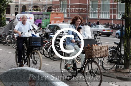 Amsterdam 4 juli 2012
Frits en Barbara Barend met (klein)zoon op de fiets.
Peter Smulders bv