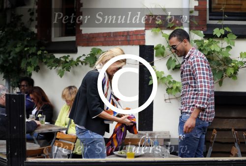 Amsterdam/Amstelveen 6 juli 2012
Badr Hari en Estelle Cruijff op terras en op weg naar reisburo in Lamborghini.
Peter Smulders bv