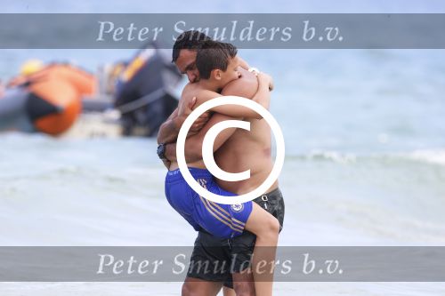 Ibiza 12 juli 2012
Ruud Gullit met zijn dochters Felicity Chermaine Joelle en zoon Maxim Gulli op vakantie op ibiza.
Peter Smulders bv