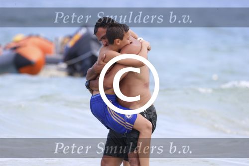 Ibiza 12 juli 2012
Ruud Gullit met zijn dochters Felicity Chermaine Joelle en zoon Maxim Gulli op vakantie op ibiza.
Peter Smulders bv