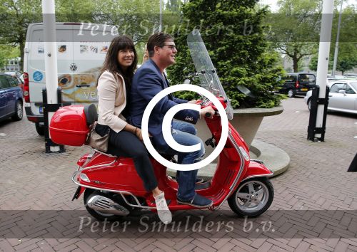 Amsterdam 19 juni 2013
Haringparty in het hilton hotel. Martijn en Amanda Krabbe op vespa scooter
Peter Smulders bv