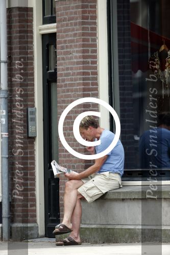 Amsterdam 19 juni 2013
Wim Kieft koopt samen met zijn dochter een krantje.
Peter Smulders bv