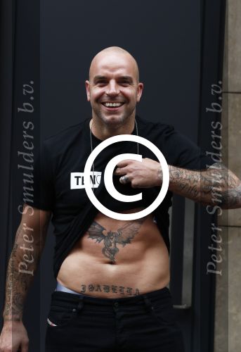 Amsterdam 21 juni 2016
Andy v d Mweyde op de pc hooftstraat met een shirt van 10official aan. (Merk van Rodney Sneijder)